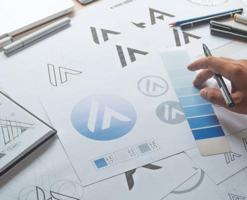 Graphic designer development process drawing, logo and label design